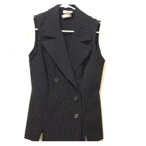 Black pinstripe button vest and dress pants